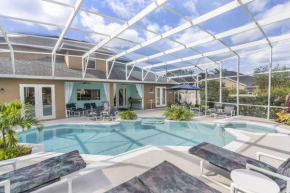 Mickeys Oyster - Luxurious 9BR Southeast Facing Pool Hot Tub Cinema Game RM BBQ 2 miles to Disney
